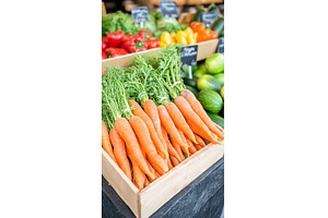 Fresh carrots on market display with, a Food & Drink Photo by Lermont51
