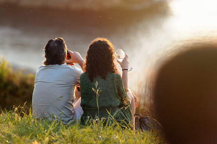 couple enjoying a sunset on the coas, a Person Photo by Perpis