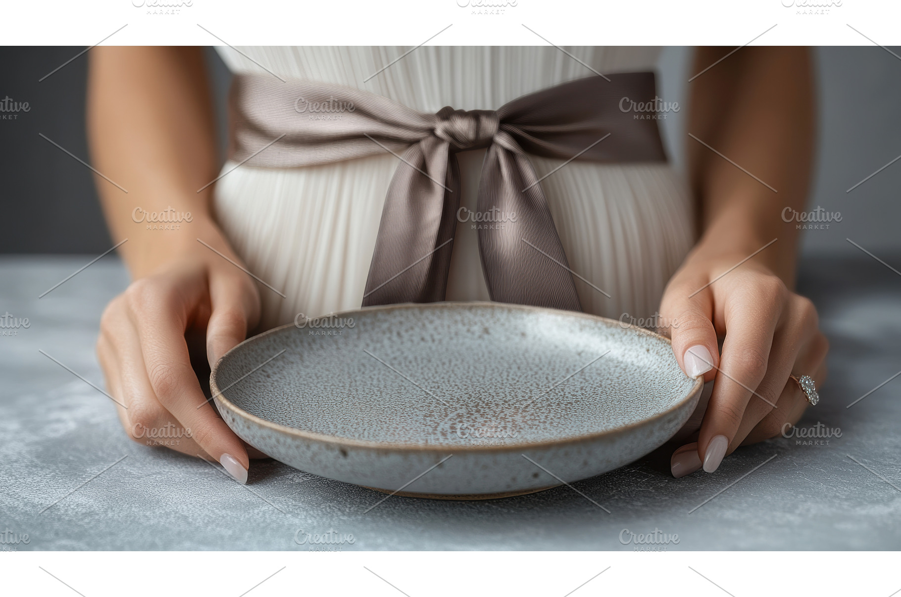 Bride holding a ceramic plate with, a Photo by Rodica Ciorba
