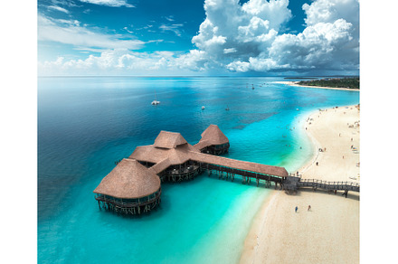 Aerial view of bungalow, white sandy, a Nature Photo by den-belitsky