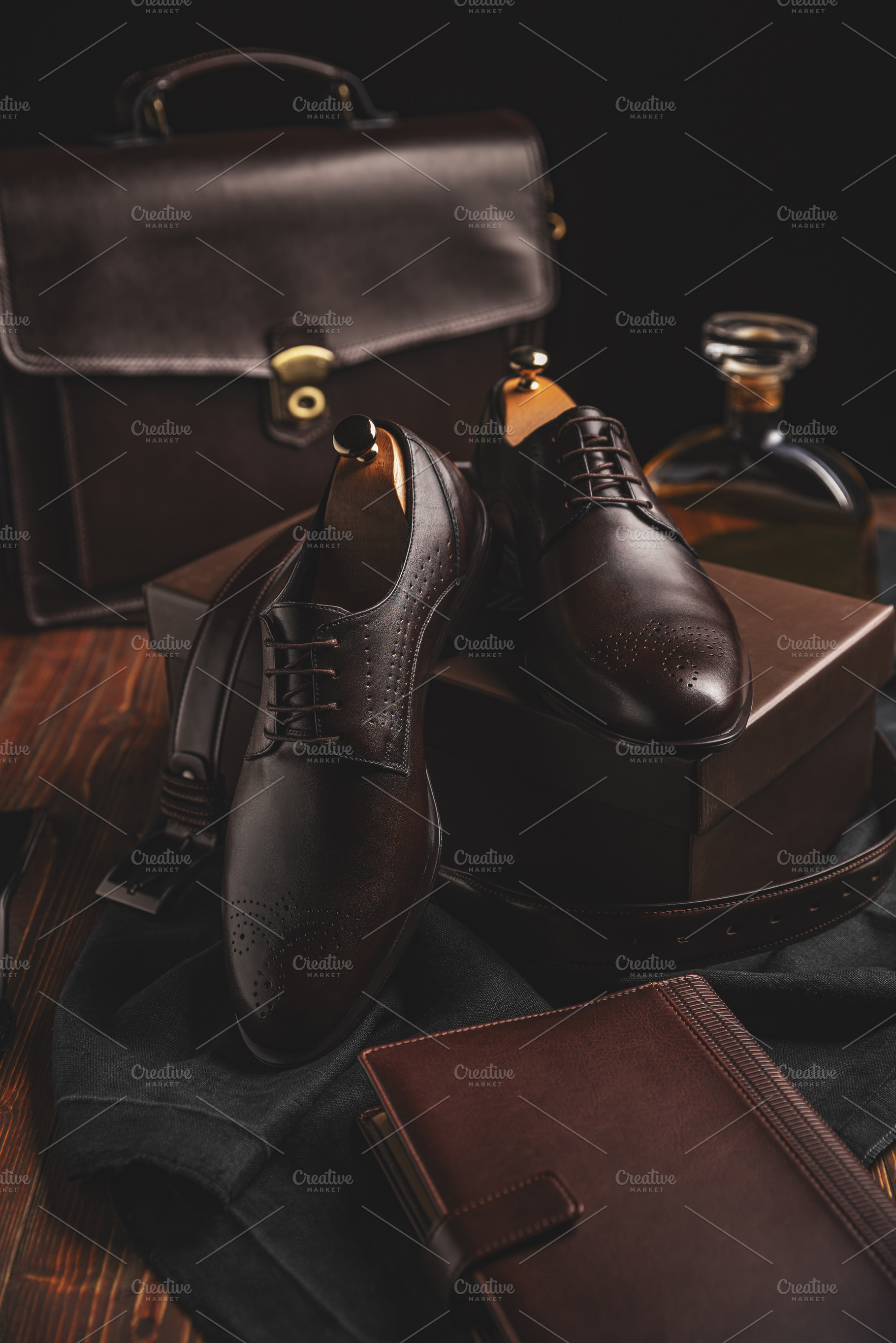 Pair of brown leather shoes, a Photo by Grafvision photography