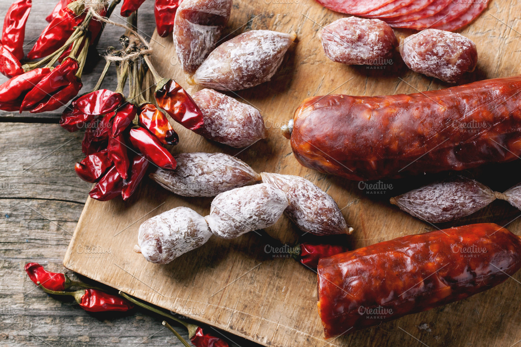Sausages and chili peppers featuring salami, ham, and food