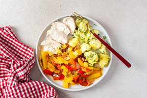 Boiled potatoes, roasted vegetables, a Food & Drink Photo by Pundateam