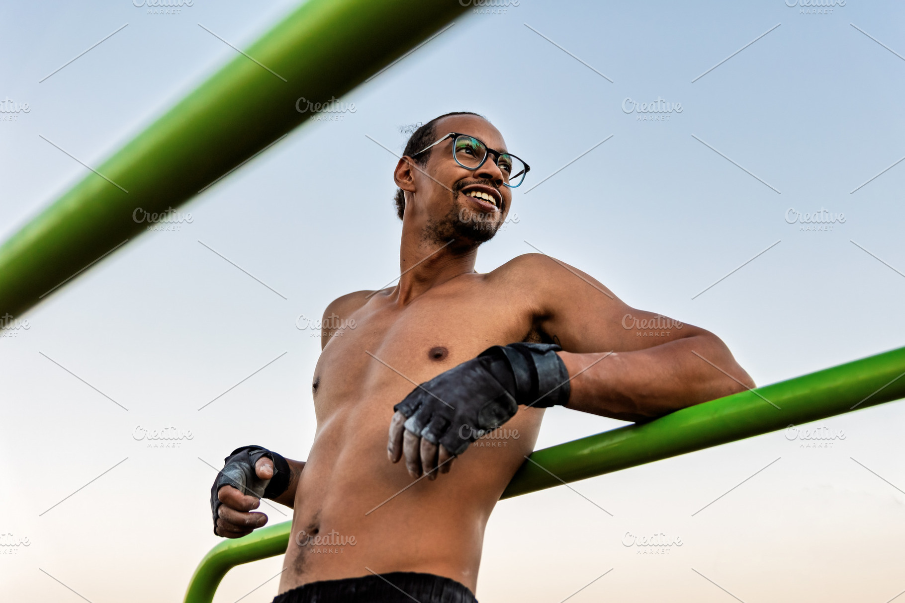 Athlete on a calisthenics bar outdoo, a Sports & Recreation Photo by Perpis