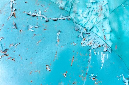 Close-up of cracked and peeling turquoise paint on a rusted meta, a Background Photo by Ales Munt