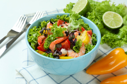 Concept of tasty eating with shrimp salad on white background, a Food & Drink Photo by AtlasStudio PRO