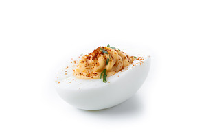 Homemade hard Boiled Deviled Eggs garnished with herbs, a Food & Drink Photo by etorres69