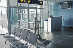Closed boarding gate in airport, a Transportation Photo by BOOCYS