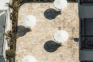 Sunny terrace with umbrellas, an Industrial Photo by SkyNext