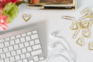 Earbuds and Keyboard Office style