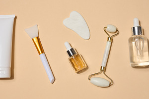 Set of cosmetics and skin care tools including tube of cream, fa, a Health & Medical Photo by ndanko