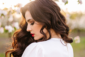 beautiful young woman outdoor AI generated, a Photo by WorldOfPhotos