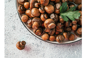 Fried mini champignons on plate, a Food & Drink Photo by Fascinadora