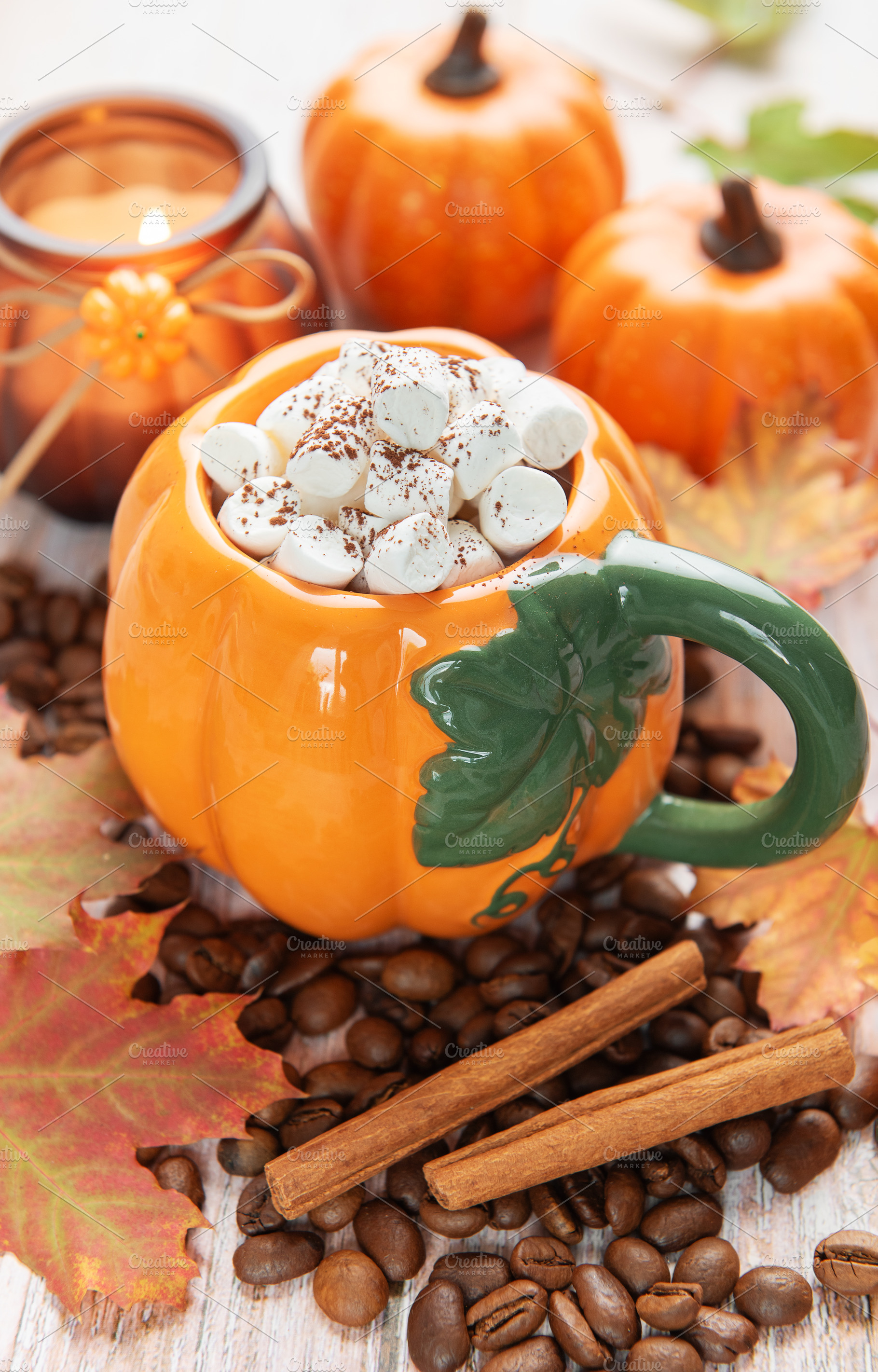 Pumpkin shaped mug with hot chocolate and marshmallows, a Food & Drink Photo by Olena Rudo