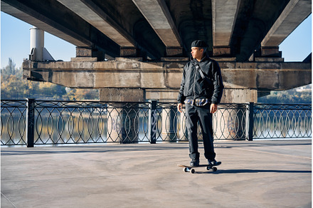 Skater rides on skateboard at empty, a Person Photo by Gladkov photography