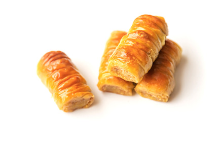 Oriental sweet baklava isolate on a, a Food & Drink Photo by yanadjana