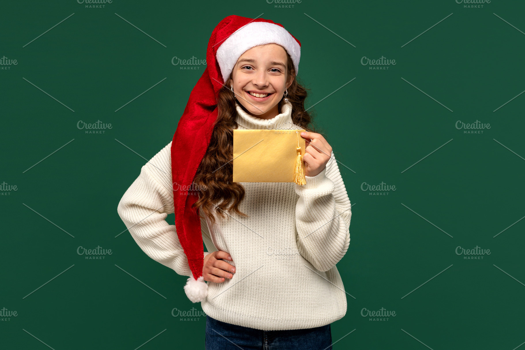 Smiling girl in Santa hat, a Person Photo by Elena Vagengeim