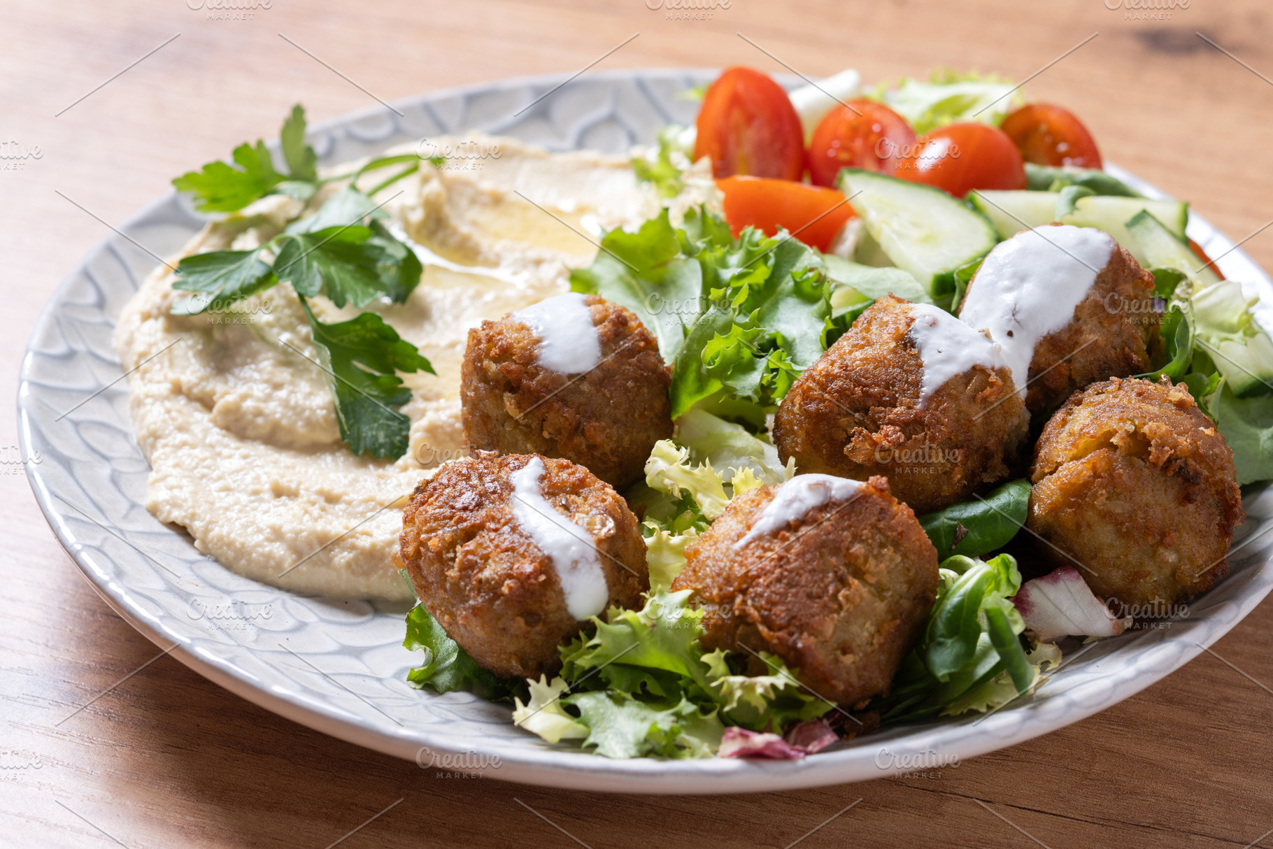 Falafel with hummus and fresh salad, a Food & Drink Photo by etorres69
