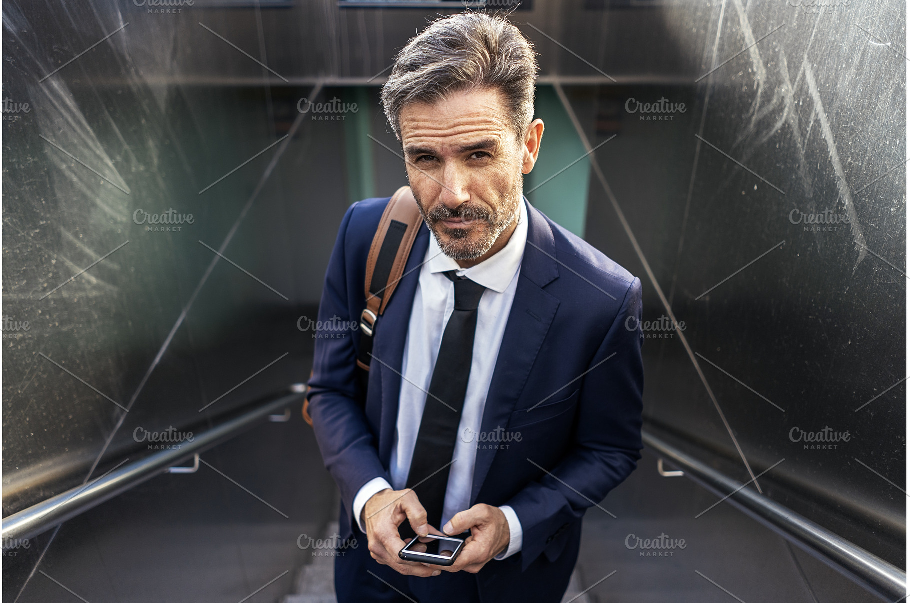 Determined businessman with, a Person Photo by nunezimage