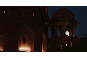 Full moon framed by arches of
