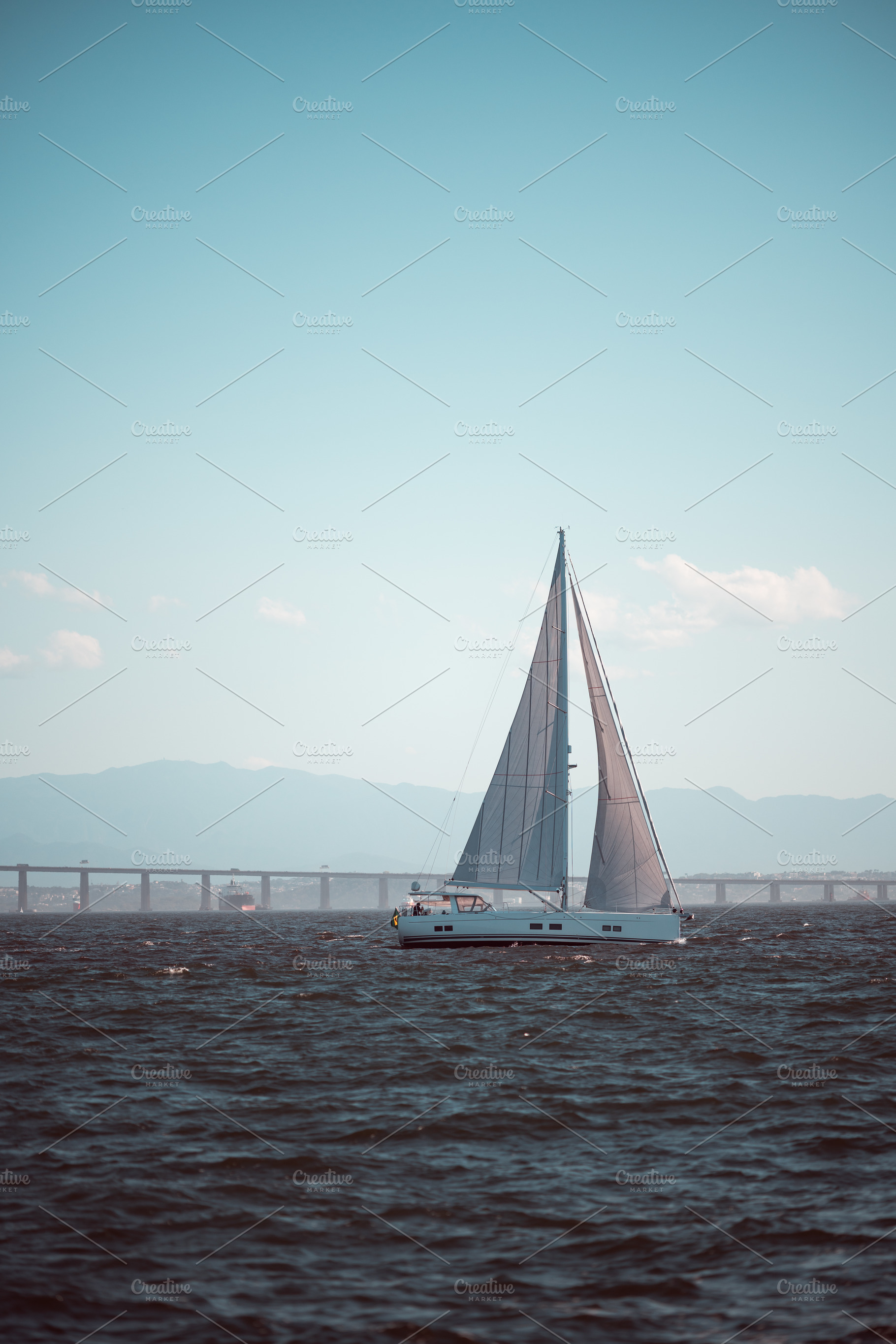 Sailing yacht at sea telephoto, a Sports & Recreation Photo by SkyNext