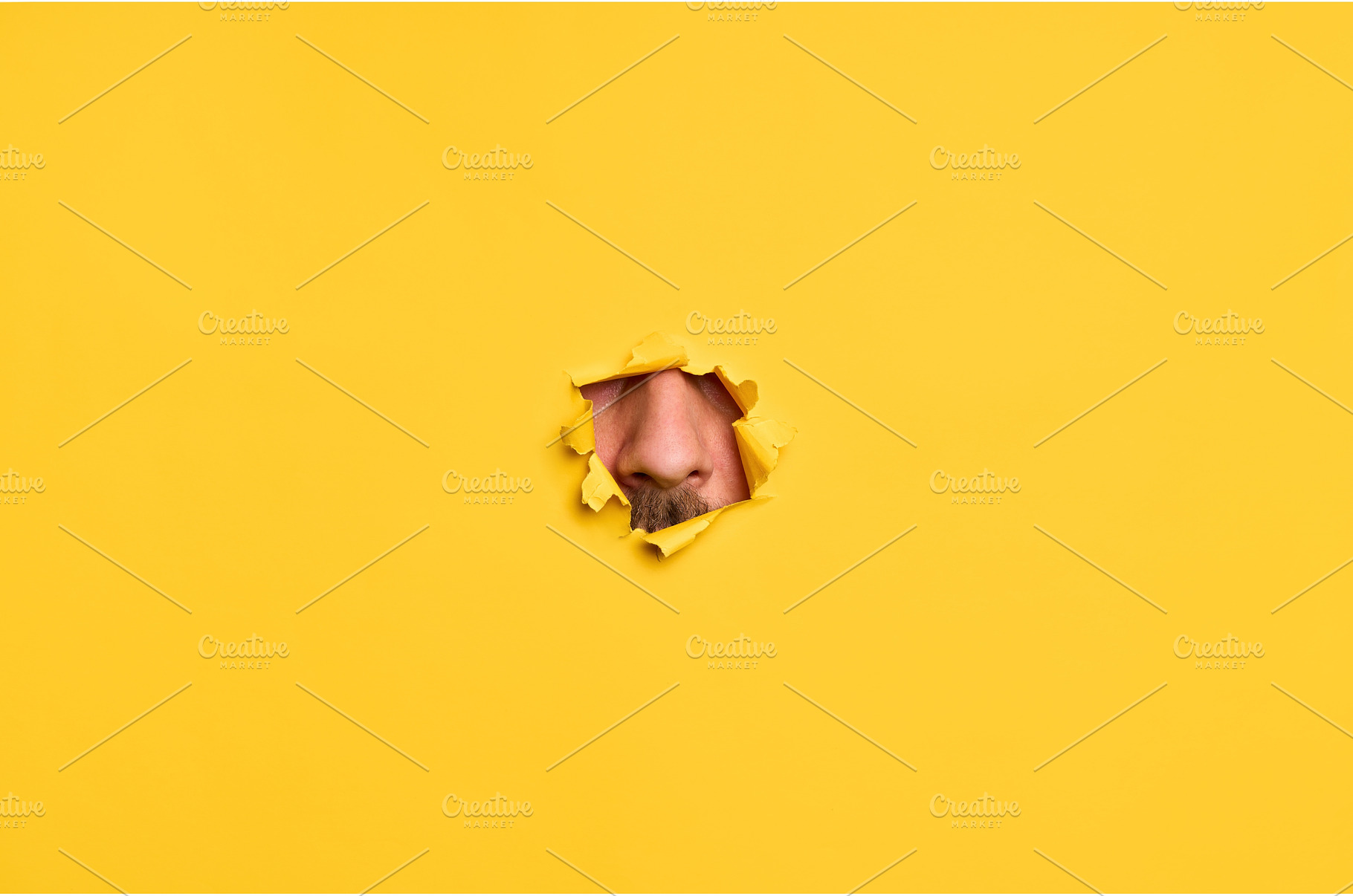 Close-up of human nose through torn, a Background Photo by Gladkov photography