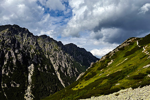 Dramatic mountain valley near Zakopane Poland with rocky cliffs and green slope, a Nature Photo by AS photostudio