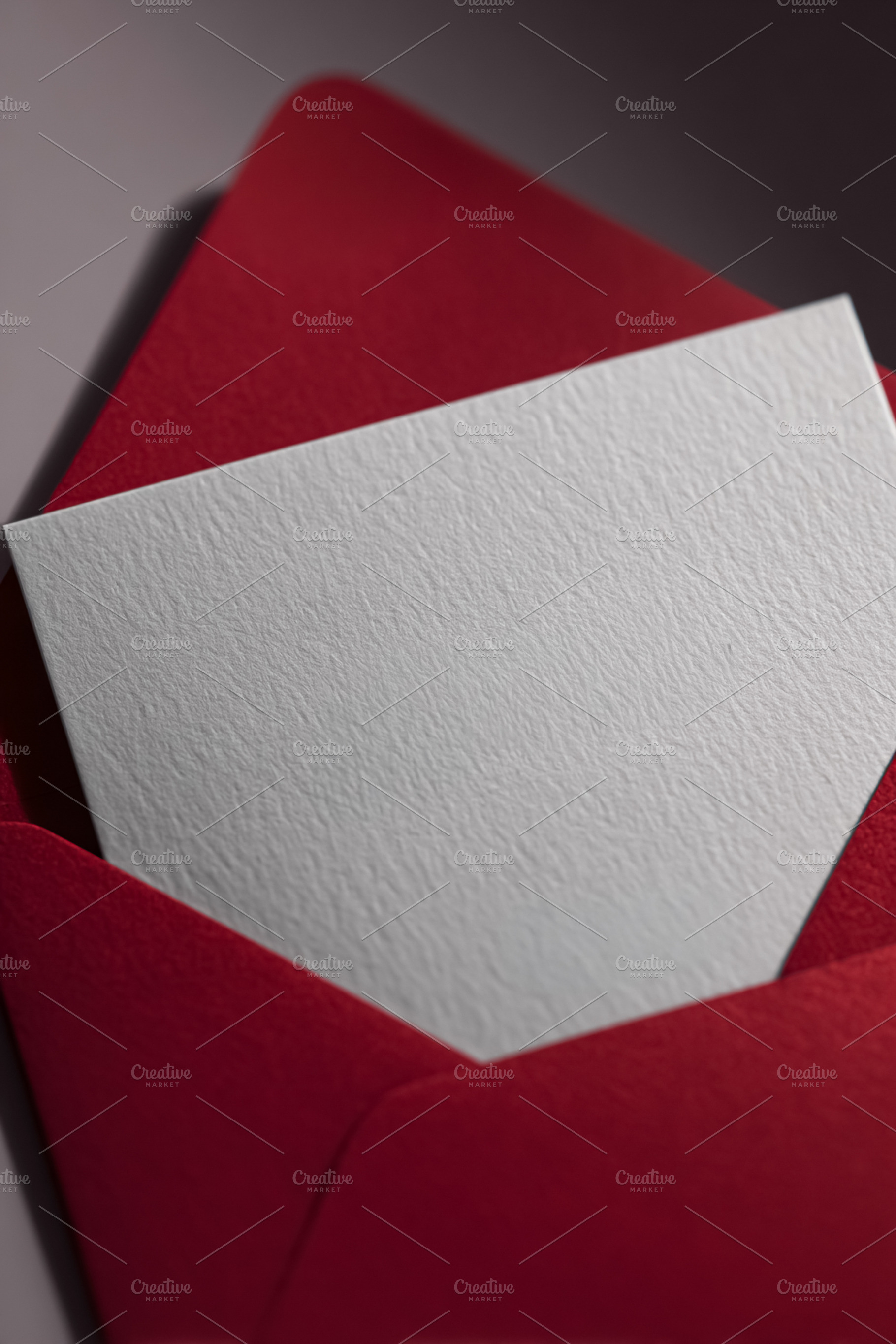 Red envelope with blank textured white card providing space for, a Photo by Studio ANNA