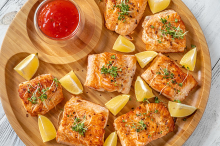 Fried salmon with sauce, a Food & Drink Photo by Alexander Prokopenko