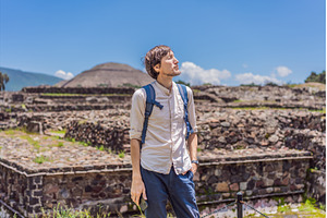 Male tourist posing in front of the, a Nature Photo by Elizaveta Galitskaya