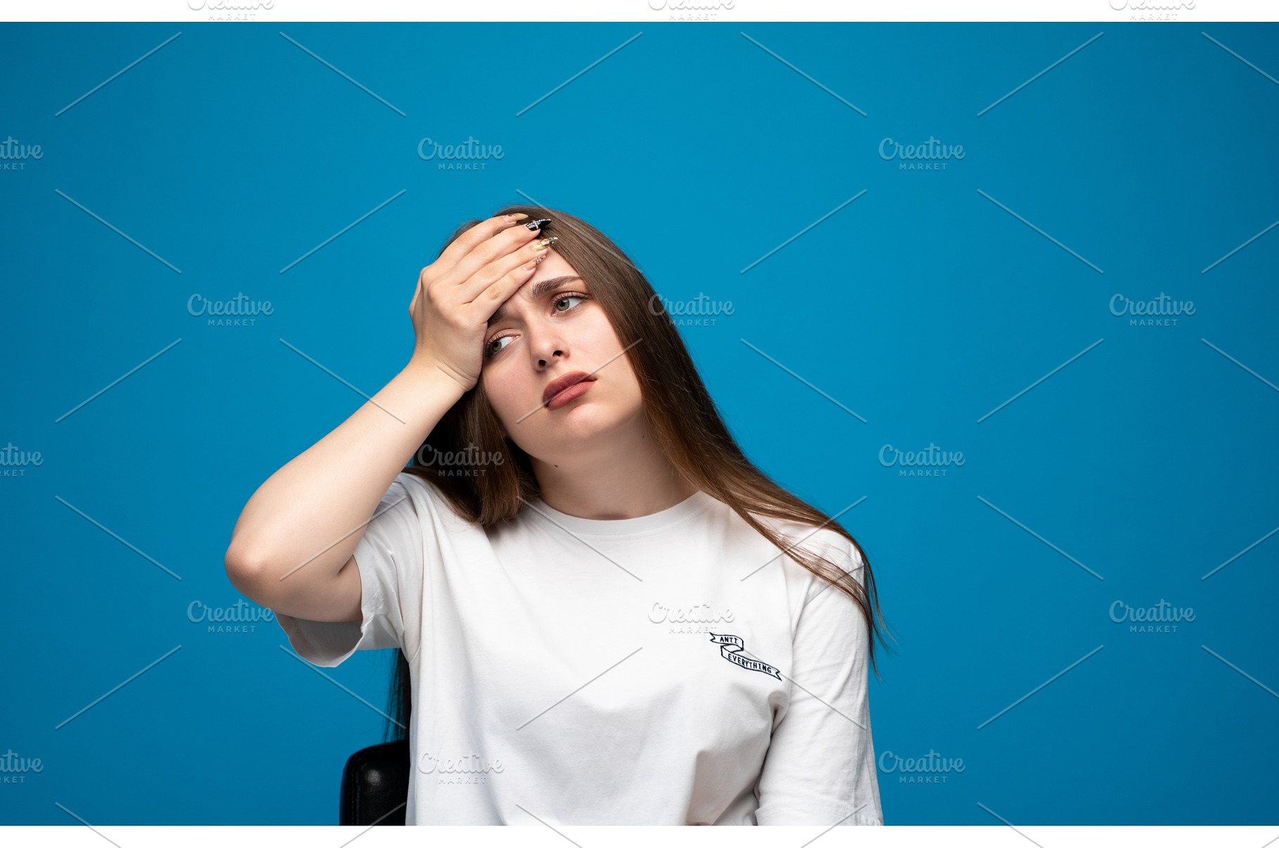 Young woman suffering from headache, a Person Photo by volodymyrshtun13795