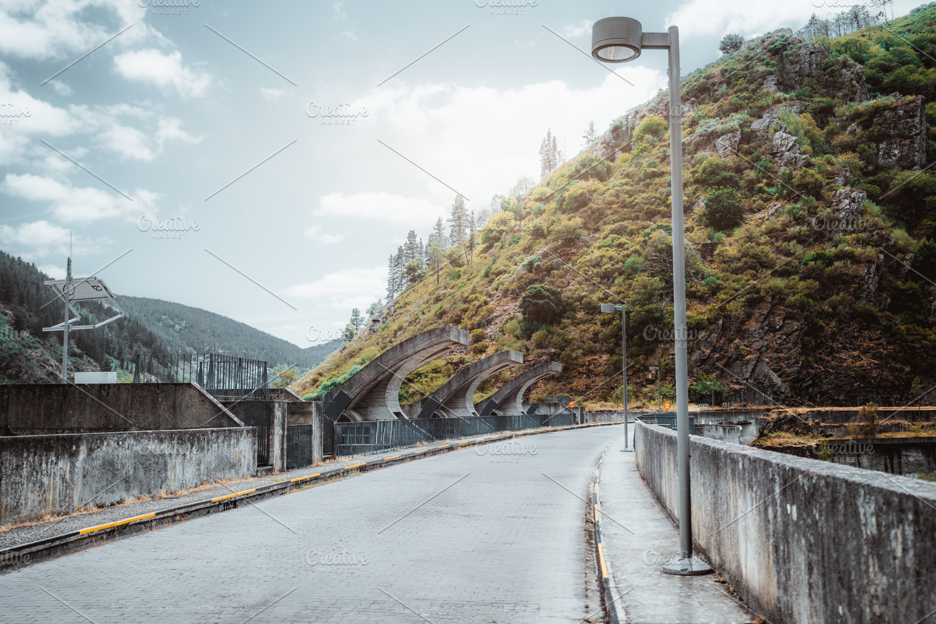 Dam road in mountain valley, an Architecture Photo by SkyNext