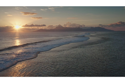 Golden sunset illuminating waves and, a Nature Photo by Goinyk