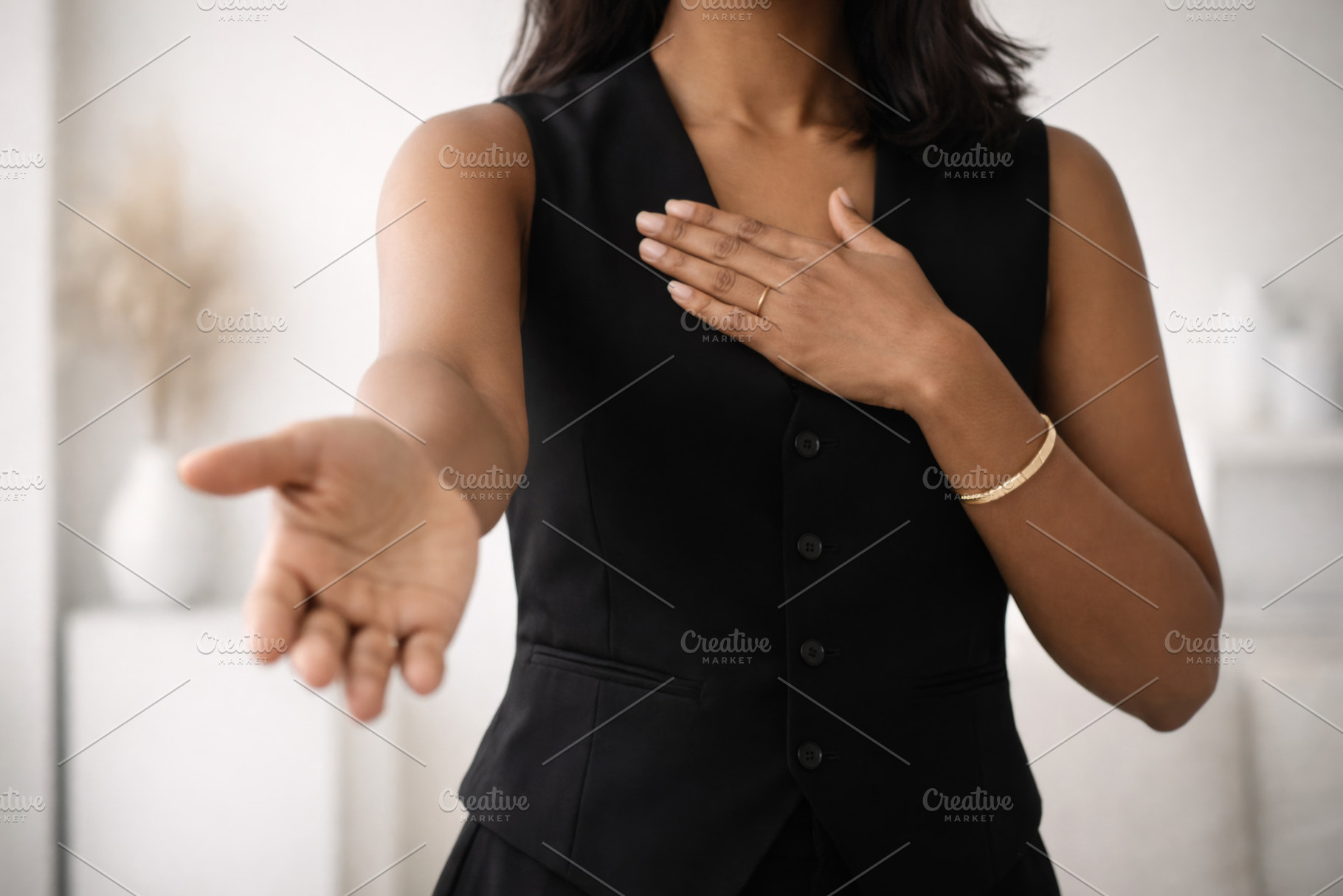 International Womens Day gesture showing woman reaching out, IWD, a Photo by Dvoevnore photos