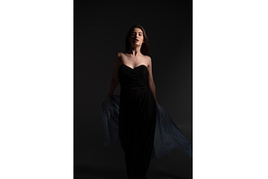 Young woman posing gracefully in, a Person Photo by volodymyrshtun13795