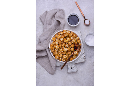 Salted caramel popcorn in bowl, a Food & Drink Photo by Yulia Furman
