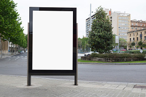 Blank billboard in the street containing billboard, advertising, and poster
