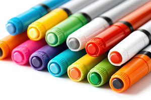 Colorful markers arranged in a row, an Abstract Photo by AlyaAnd
