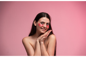 Young woman smiling while wearing, a Health & Medical Photo by volodymyrshtun13795