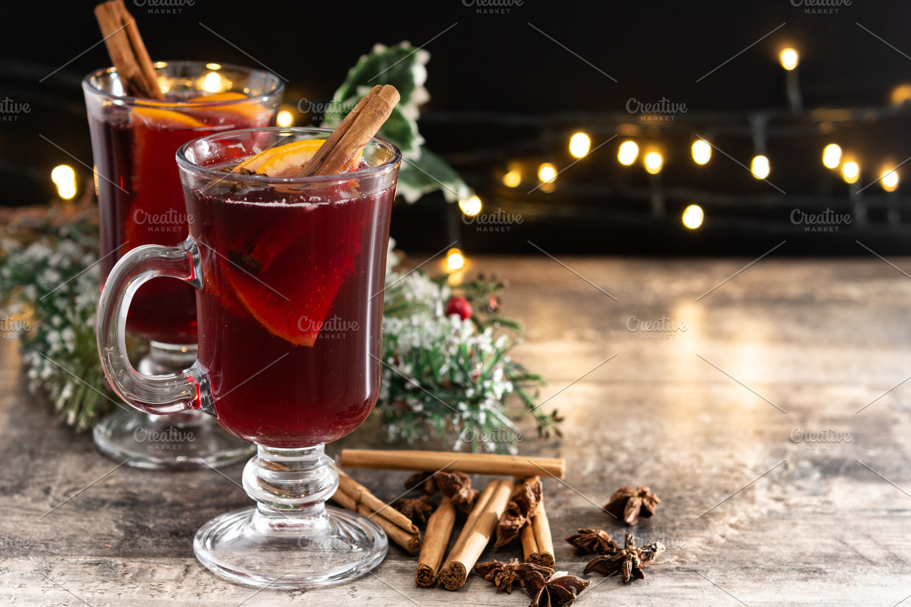 Mulled Wine with Orange and Cinnamon Sticks and Christmas decoration, a Food & Drink Photo by etorres69