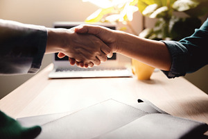 Shaking Hand together. Sign of Human Cooperation ,Agreement, Con, a Photo by salmon.black