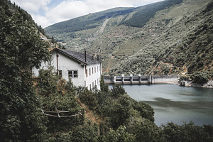 House by reservoir and concrete dam, an Architecture Photo by SkyNext