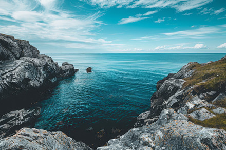 The tranquil scene captures a blue s, a Photo by Tanuart