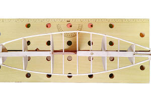 Handcrafted wooden model of a sailboat under construction., a Sports & Recreation Photo by DanFLCreativo