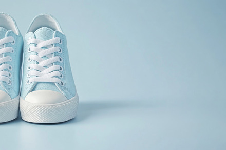 Pink sneakers on color background, a Photo by Dvoevnore photos