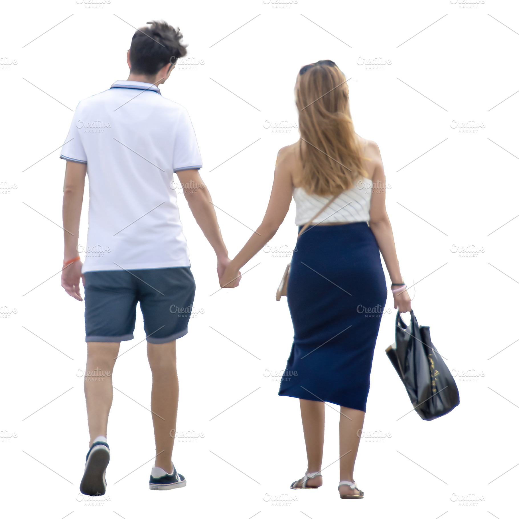 Isolated image of young couple walking and holding hands, a Person Photo by DanFLCreativo