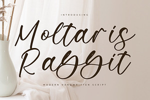 Moltaris Rabbit, a Script Font by Integritype Studio