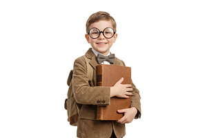 Happy Boy With a School Book, a School & Education Photo by CREATIVEDEF