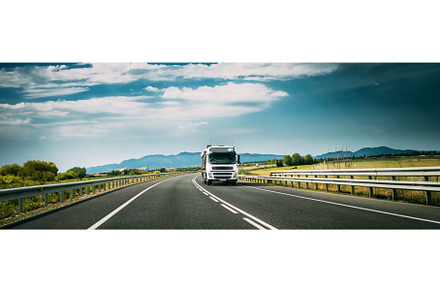 White Truck Or Traction Unit In, a Transportation Photo by Our Amazing World