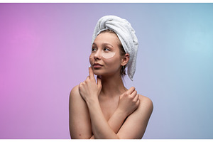 Young woman with a towel wrapped, a Person Photo by volodymyrshtun13795